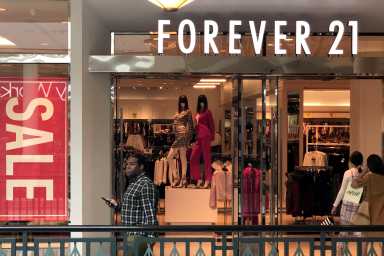 FILE PHOTO: Shoppers enter a Forever 21 fashion retail store at the King of Prussia mall in King of Prussia, Pennsylvania, U.S. September 30, 2019.